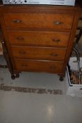 An early 20th century compact bedroom chest of four drawers, width approx. 68cm