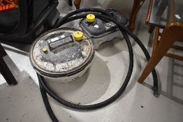 A wallpaper steam stripper