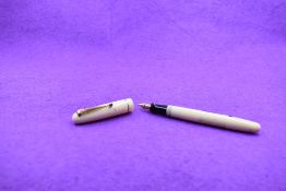 A Mabie Todd & Co Swan 3130 Self filler leverfill in ivory, single band to cap, with Swan No1 nib.