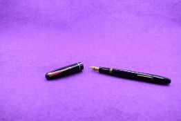 A Mabie Todd & Co Swan 3120 Self filler leverfill in dark blue, single band to cap, with Swan No1