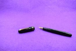 A Mabie Todd & Co Swan 3240 Self Filler Leverfill, in dark green with two bands to the cap and a