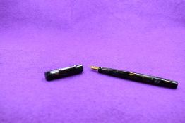 A Mabie Todd & co Swan Minor M1 leverfill fountain pen in marble , screw cap, with Swan No1 nib.