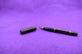 A Mabie Todd & Co Blackbird Self filler Leverfill fountain pen, in BHR (slightly discoloured) with