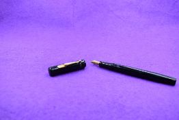 A Mabie Todd & Co Swan L205/60 Leverless twist filler, in black with a single band to cap and a Swan