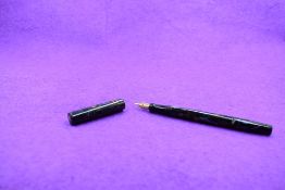 A Mabie Todd and Co Swan Minor leverfill fountain pen in multi colours with a Swan 1 nib. Approx