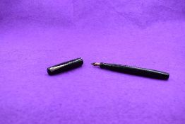 A Mabie Todd & Co Self filler leverfill fountain pen in black with chased design with Swan No1