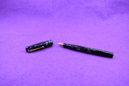 A Mabie Todd & Co Swan 6142 Self filler leverfill in grey marble with a single narrow gold bands