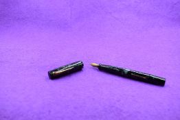 A Mabie Todd & Co Blackbird BB2/42 Self filler Leverfill fountain pen, in blue/grey marble, a