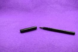 A Mabie Todd & Co Blackbird dipping pen, in chased BHR a MT & Co 2C nib. Approx 13.9cm