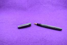 A Mabie Todd & Co Swan 3130 Self filler leverfill in grey, single band to cap, with Swan No1 nib.