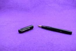 A Conway Stewart 472 'The Universal Pen' in HBR, leverfill with a 14ct gold nib, nib in poor