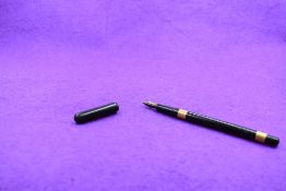 A Mabie Todd and Co 'the Swan Pen' eyedropper fountain pen, in BHR with two broad gold bands to