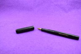 An Early Mabie Todd & Co Self Filler, leverfill fountain pen in BHR with Swan No2 14ct gold nib