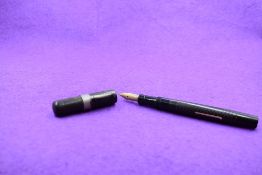 A Mabie Todd and Co Swan SF5 Self-filler lever fill fountain pen in BHR with chased pattern having a