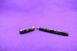 A Mabie Todd & Co Blackbird 5245 Self filler Leverfill fountain pen, in grey/green marble, a