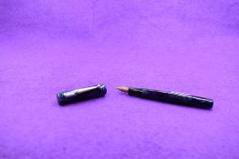 A Mabie Todd & Co Blackbird Self filler Leverfill fountain pen, in blue marble, with two narrow