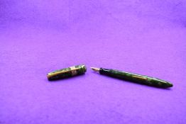 A Mabie Todd & Co Blackbird Self filler Leverfill fountain pen, in green marble, a Blackbird nib.