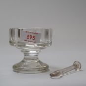 A squat form glass ice crusher having a hexagonal styled design