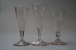 Three ale glasses decorated bowls with hops and barley
