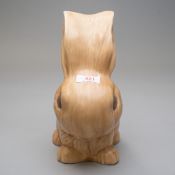A mid century figure study of a rabbit by Sylvac number 1028 in a natural brown colour way, 24cm
