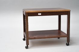 A vintage stained frame coffee table, with plastic casters fitted