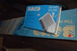 A Bond knitting machine and an extension kit