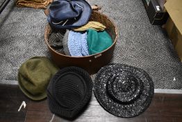 A hat case containing assorted vintage hats, 1940s to late 60s/early 70s.