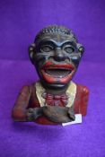 A late Victorian genuine cast iron character money box