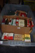 A selection of vintage cigarette advertising boxes and packets