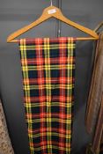 A good length of bright wool or wool blend tartan.