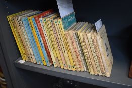 A selection of childrens story books including Beatrix Potter and Enid Blyton Famous Five