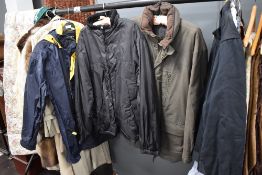 Four mens jackets including waterproof and canvas.