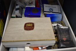 A selection of vintage cigarette advertising packets and boxes