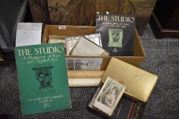 A selection of ephemera including maps magazines and black and postcards
