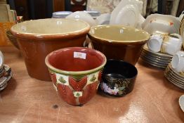 Two large salt glazed cream or butter bowls and two planters