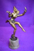 An art deco dancing figure sculpture metal cast on marble style base with a gilt finish marked