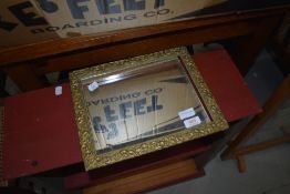 A vintage brass frame wall mirror, of small proportions, approx. 32 x 26cm (please note glass