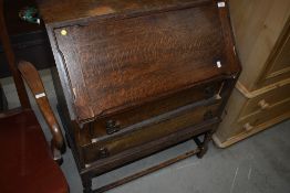 An early 20th Century oak bureau