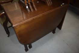 A mid 20th Century oak gateleg dining table