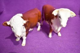 Two Beswick Hereford bull figure studies Bull 949 and Polled Bull 2549A