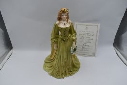 A Royal Worcester Compton & Woodhouse limited edition Figurine, The Golden Girl Of May 527/7500 with