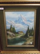 An oil painting, Continental landscape, indistinctly signed, 40 x 30cm, plus frame and glazed