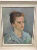 An oil painting, Noelle Knight, lady in blue, signed and dated 1967, 49 x 39cm, plus frame