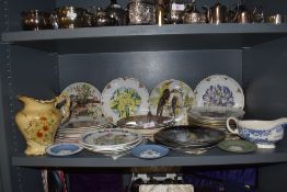 A selection of various ceramic and porcelain display plates and Wedgwood