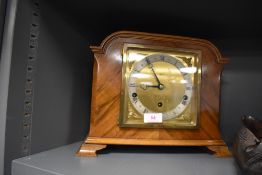 A fine mantle clock having wooden case with ormolu face by Elliott Reid