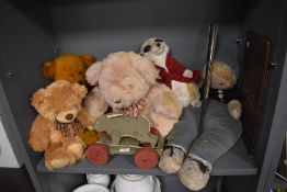 A selection of child toy teddy bears and similar including wooden hare toy and a Chinese fan
