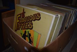 A selection of vinyl records and albums including Rainbow Buddy Holly etc