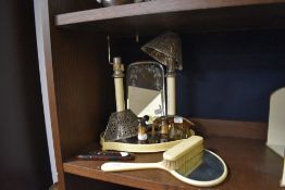 A selection of vintage bone or similar dressing table items including mirrors, an early 20th century