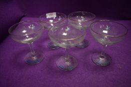 A set of five vintage Babycham advertising glasses