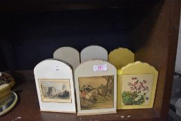 A selection of treen book ends including hunting themed